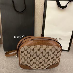 Authentic Canvas Gucci crossbody Purse.